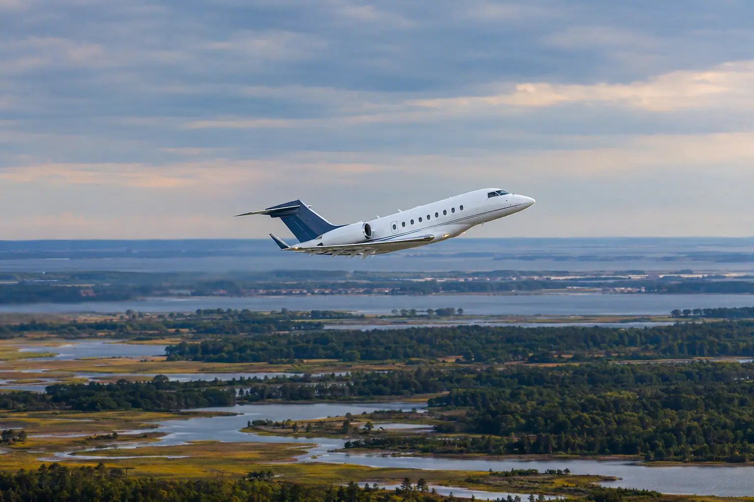 Private jet climbing out over the US